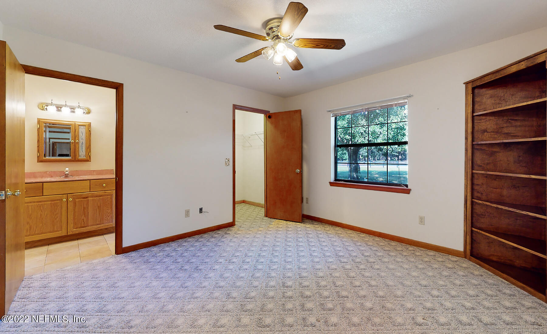 45918 Bismark Road Callahan, FL 32011 - Photo 26 of 45 a view of an empty room with a window and cabinet