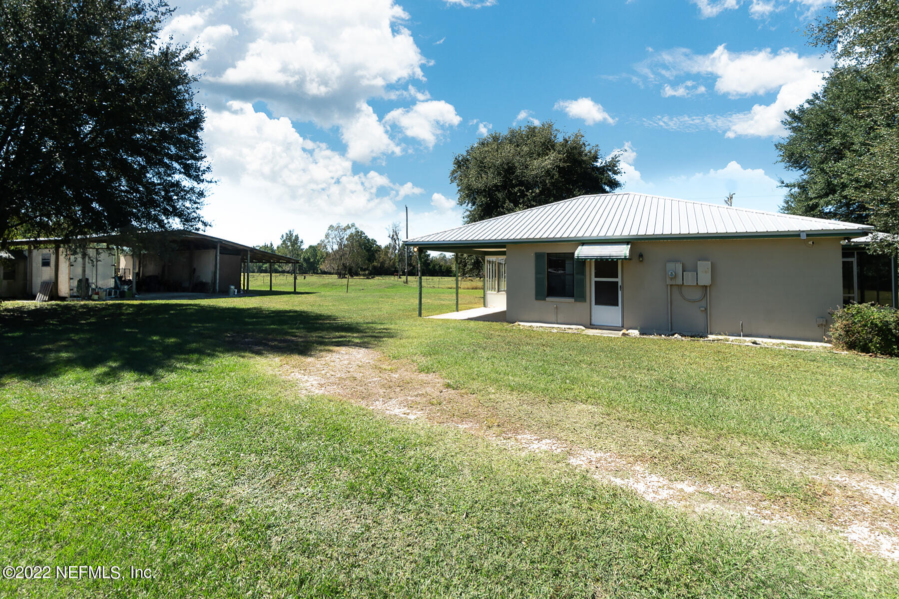 45918 Bismark Road Callahan, FL 32011 - Photo 33 of 45 a view of a house with a yard