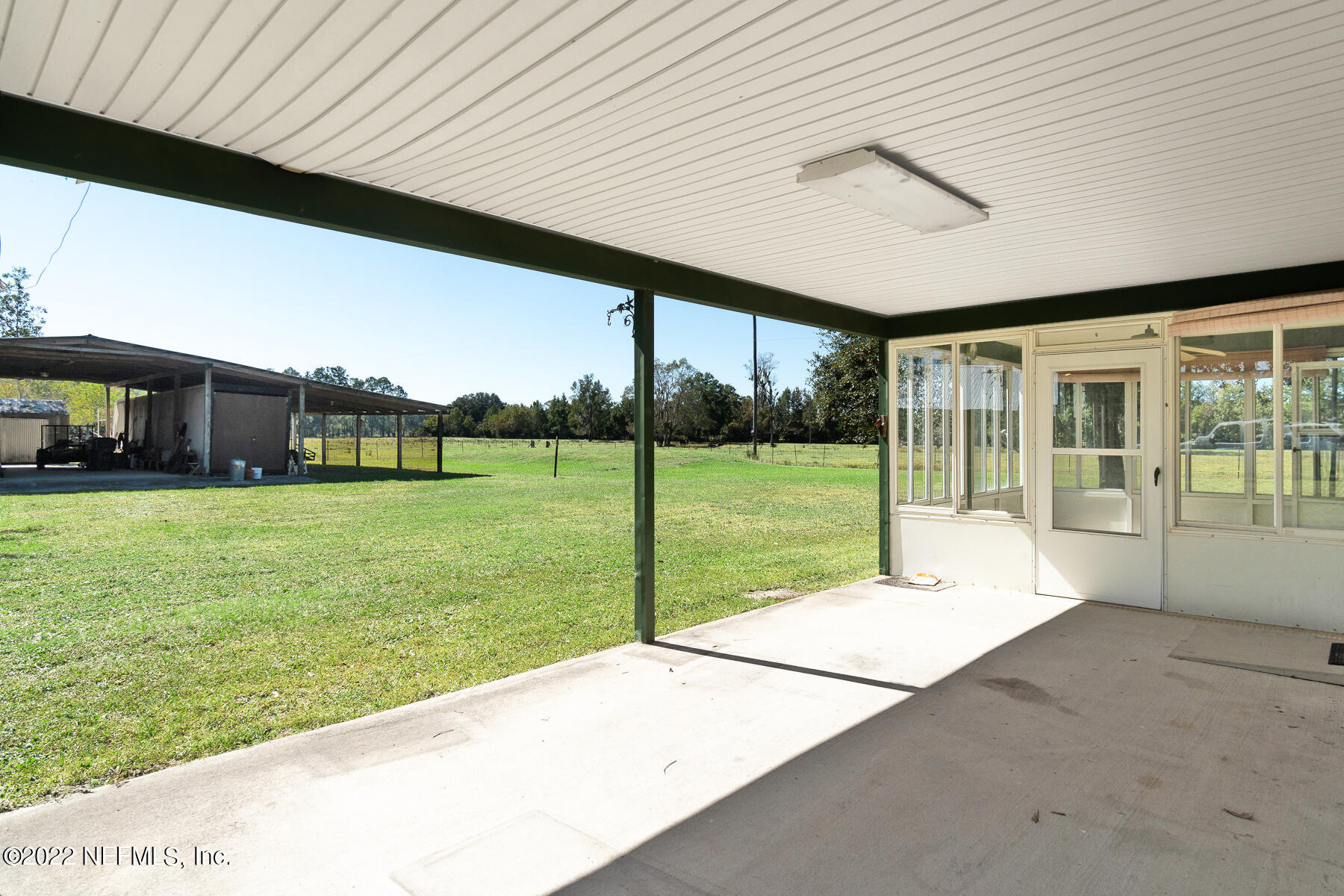 45918 Bismark Road Callahan, FL 32011 - Photo 37 of 45 a view of a house with a big yard