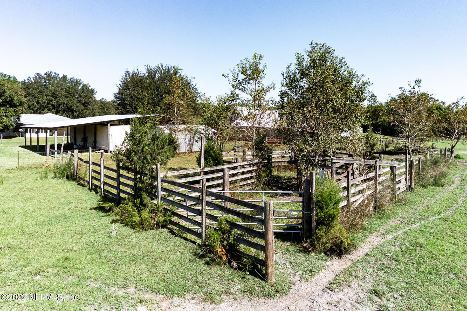 45918 Bismark Road Callahan, FL 32011 - Photo 40 of 45 a backyard of a house with lots of green space