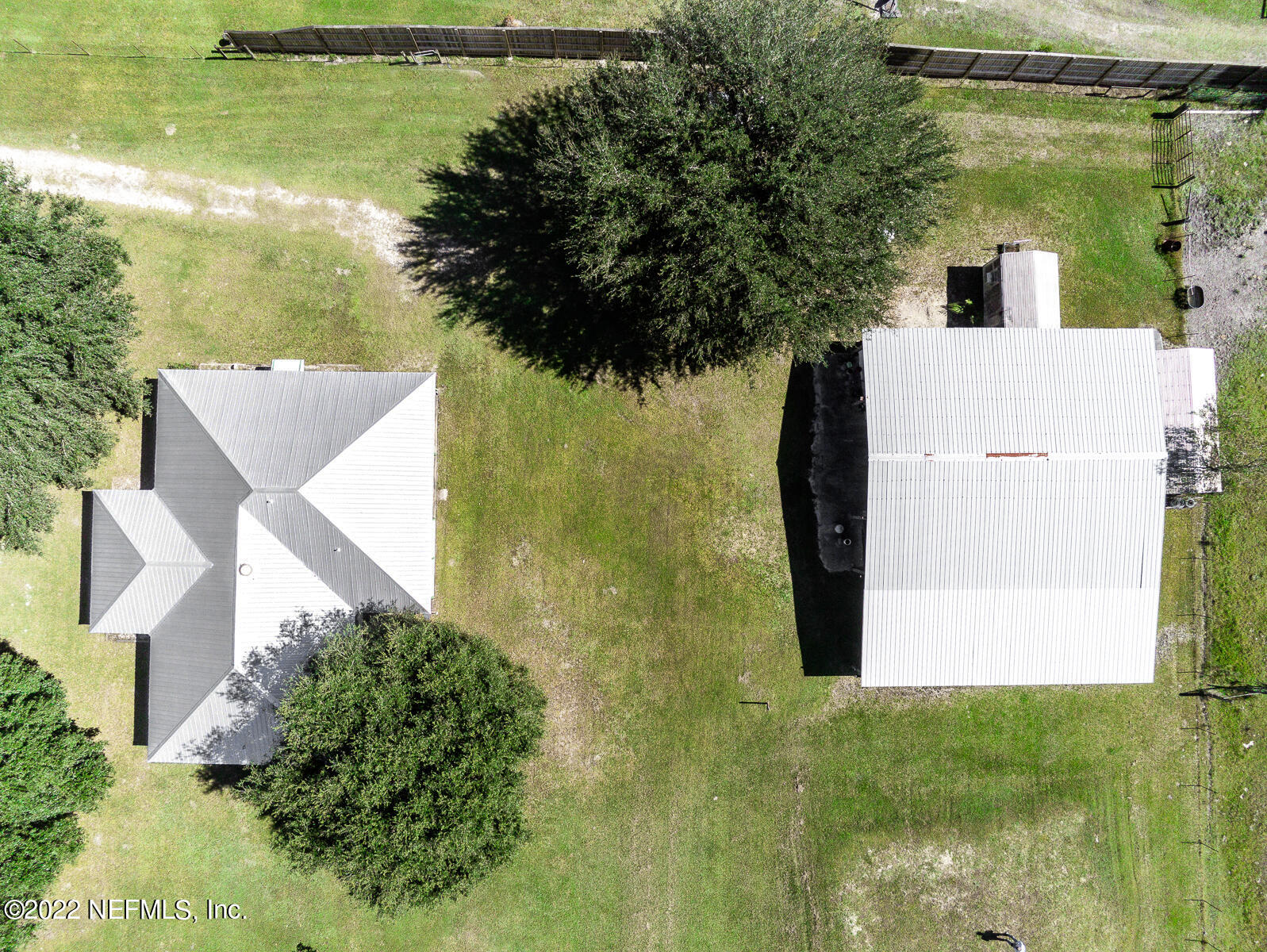 45918 Bismark Road Callahan, FL 32011 - Photo 44 of 45 an aerial view of residential house with pool and yard