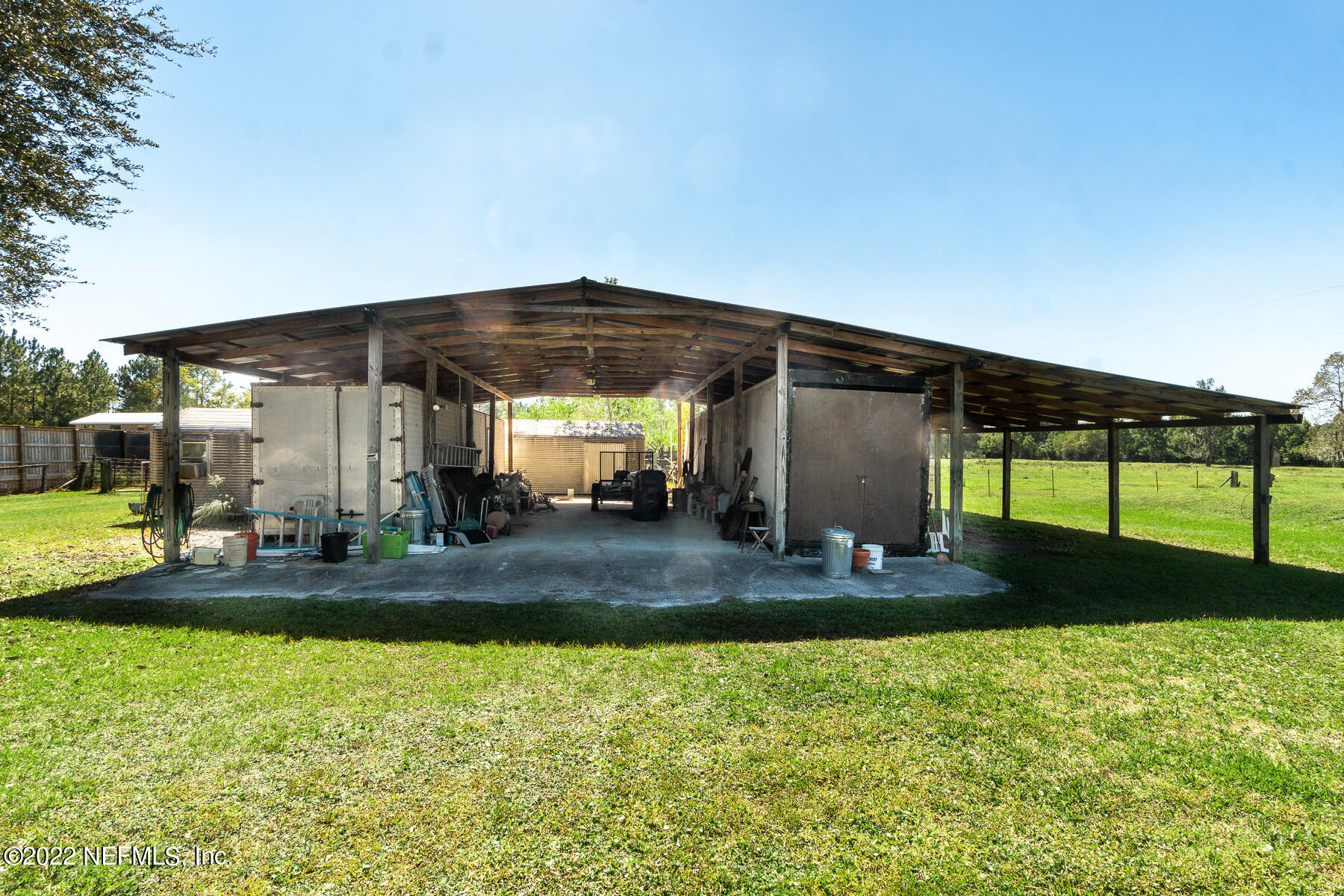 45918 Bismark Road Callahan, FL 32011 - Photo 6 of 45 a view of a house with backyard and sitting area