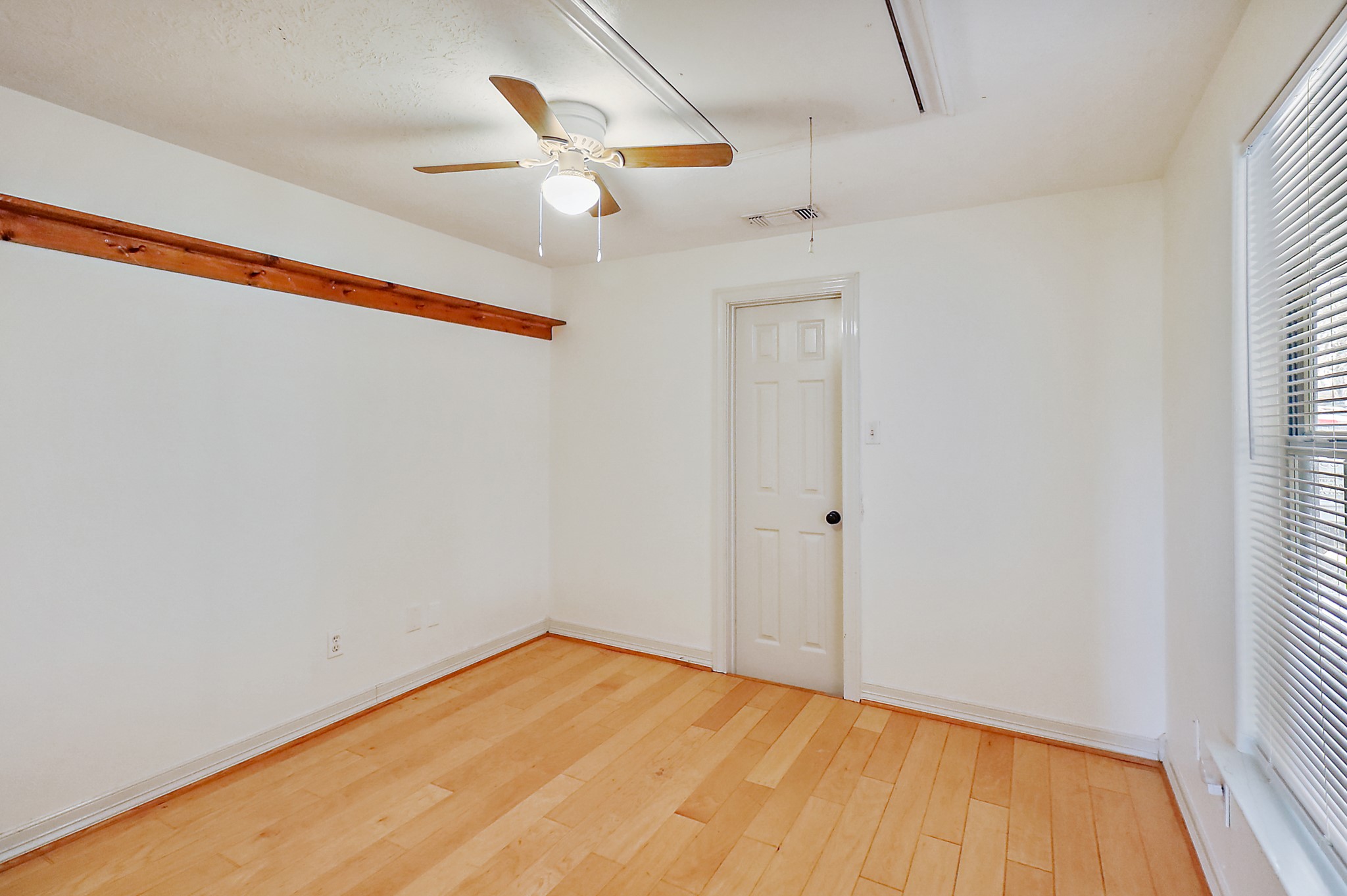 1306 Spring Branch Drive Baytown, TX 77523 - Photo 14 of 38 a view of empty room with wooden floor