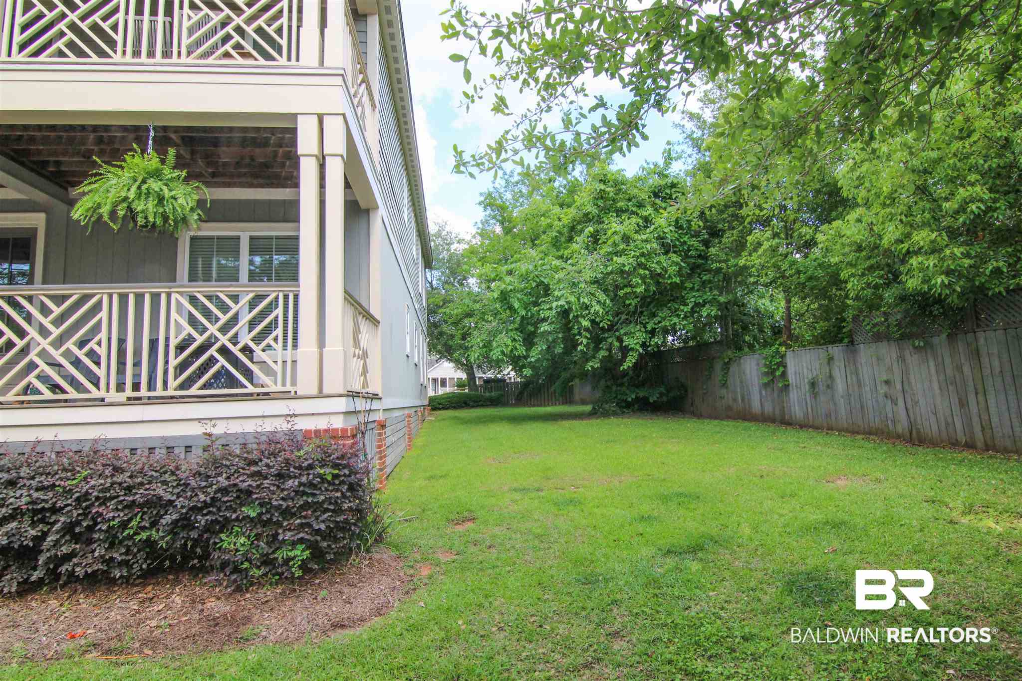 25806 Pollard Road, Unit 109 Daphne, AL 36526 - Photo 23 of 32 Side Yard