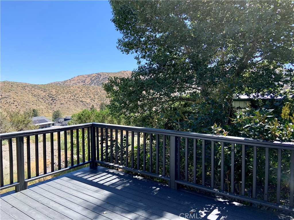5507 Zermatt Drive Wrightwood, CA 92397 - Photo 27 of 31 a view of balcony with wooden fence