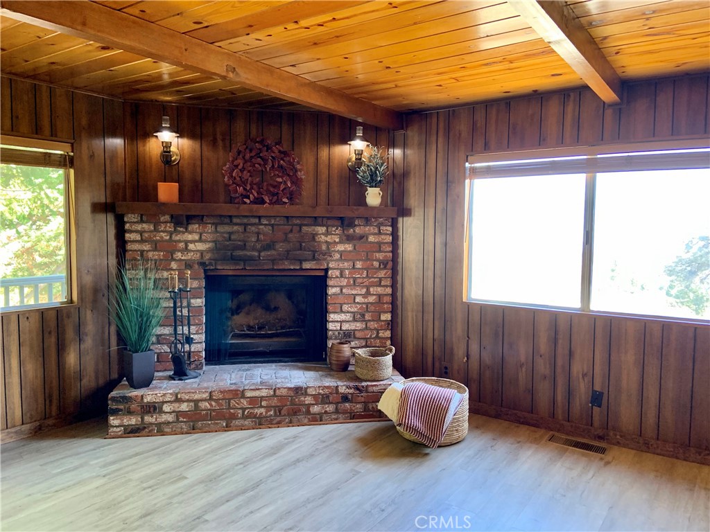 5507 Zermatt Drive Wrightwood, CA 92397 - Photo 4 of 31 a room with furniture and a fireplace