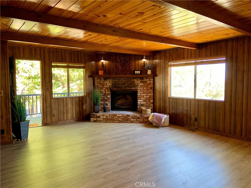 5507 Zermatt Drive Wrightwood, CA 92397 - Photo 5 of 31 a view of an empty room with window and fire place