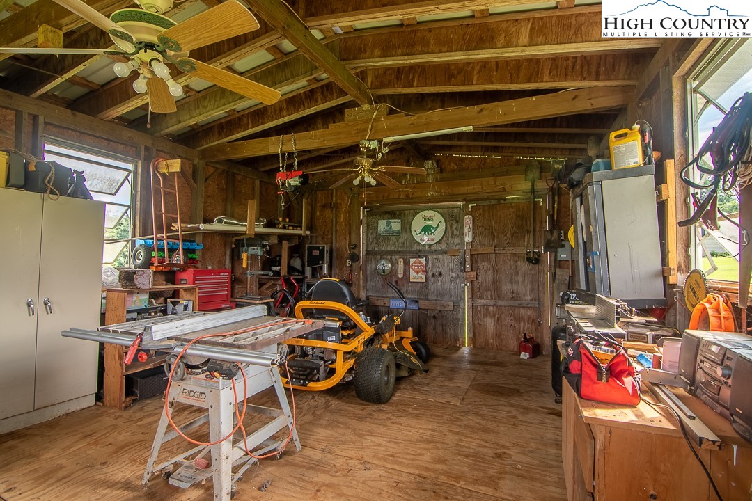 2411 Glade Valley Road Sparta, NC 28675 - Photo 27 of 50 a view of a storage room with a lot of stuff