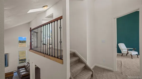 a view of entryway with stairs and furniture