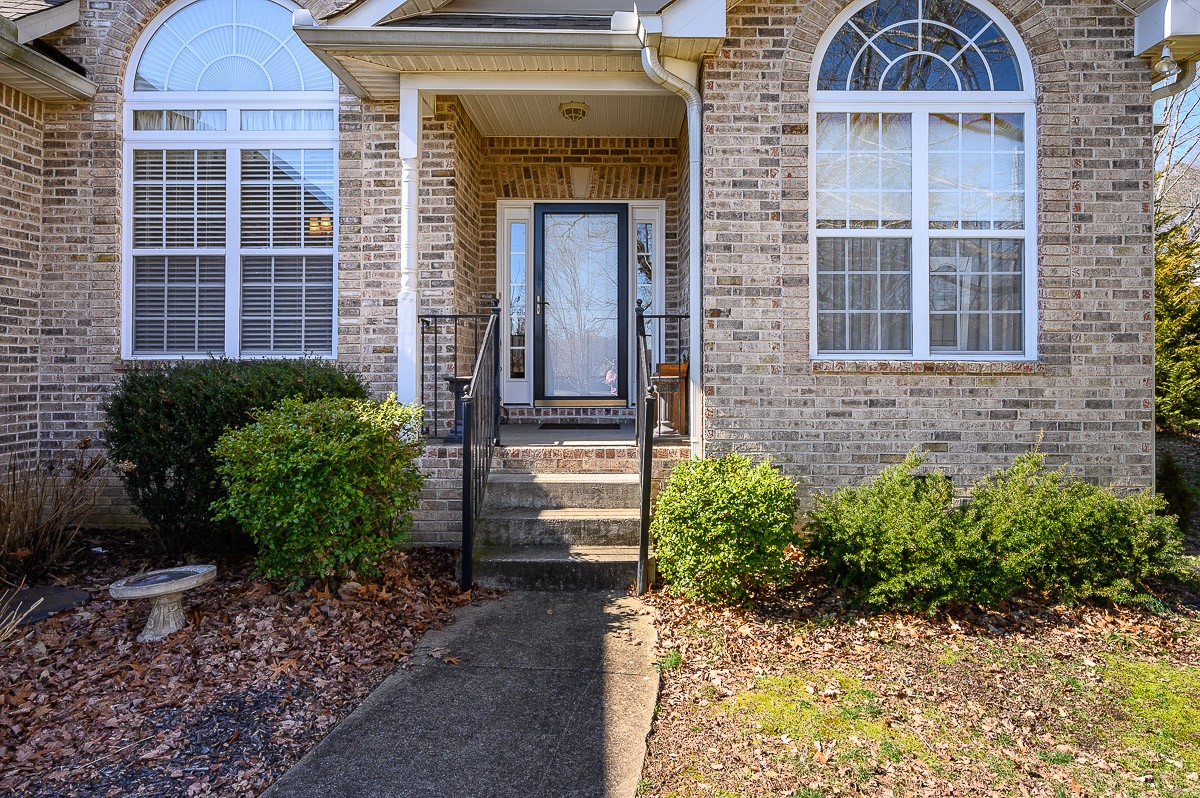 7116 Fernvale Road Fairview, TN 37062 - Photo 3 of 38 a front view of a house with a yard
