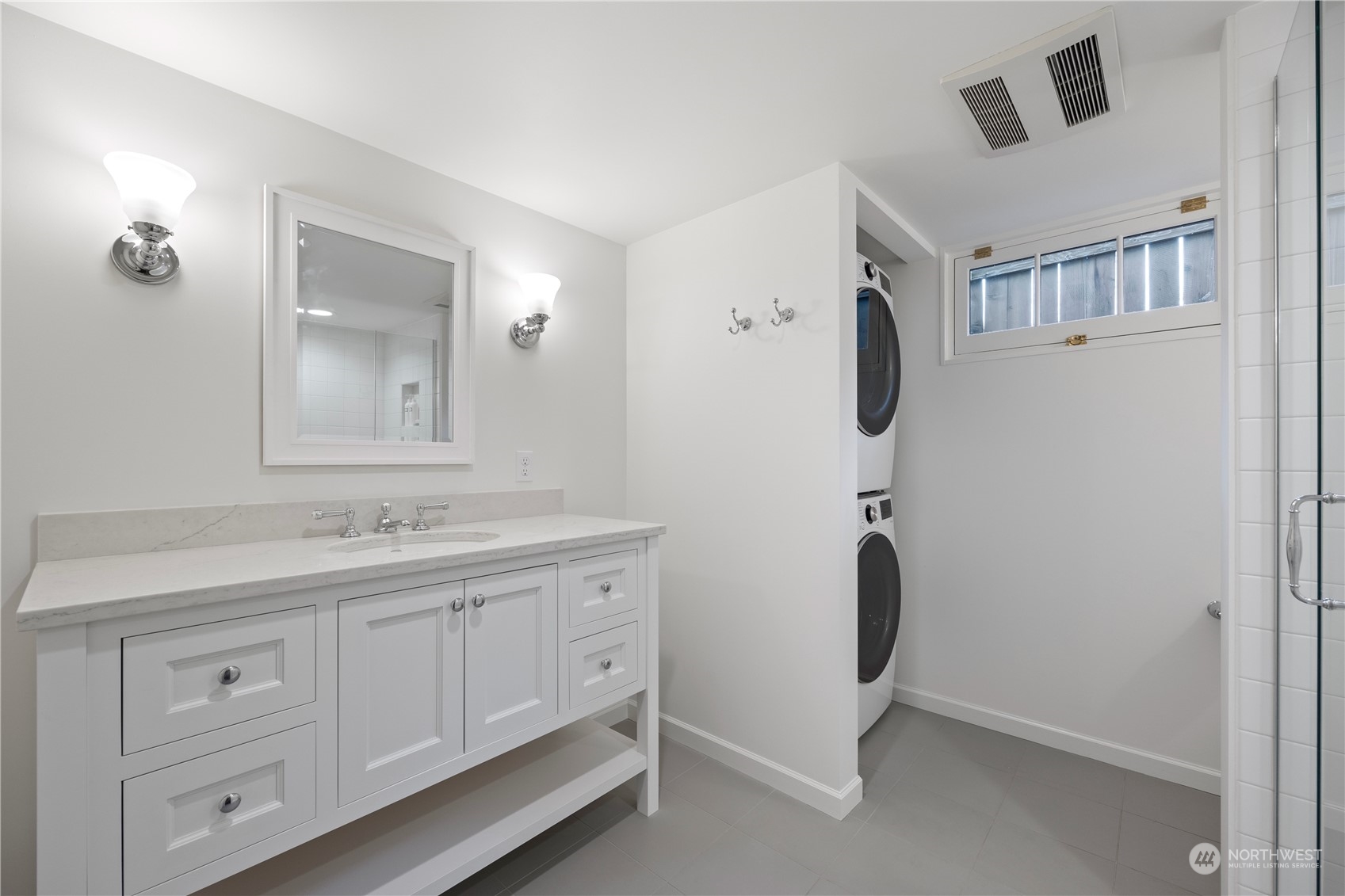 209 North Colville Street Walla Walla, WA 99362 - Photo 26 of 32 a bathroom with a double vanity sink and mirror
