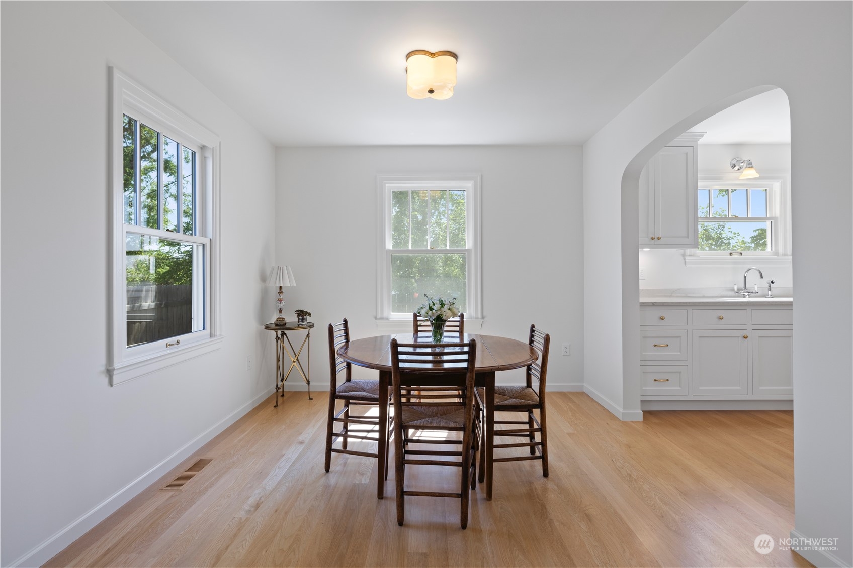 209 North Colville Street Walla Walla, WA 99362 - Photo 6 of 32 a view of a dining room with furniture and wooden floor