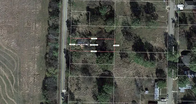 a view of a yard with an outdoor space