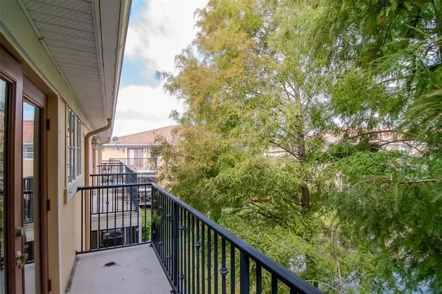 a view of a balcony with an outdoor space