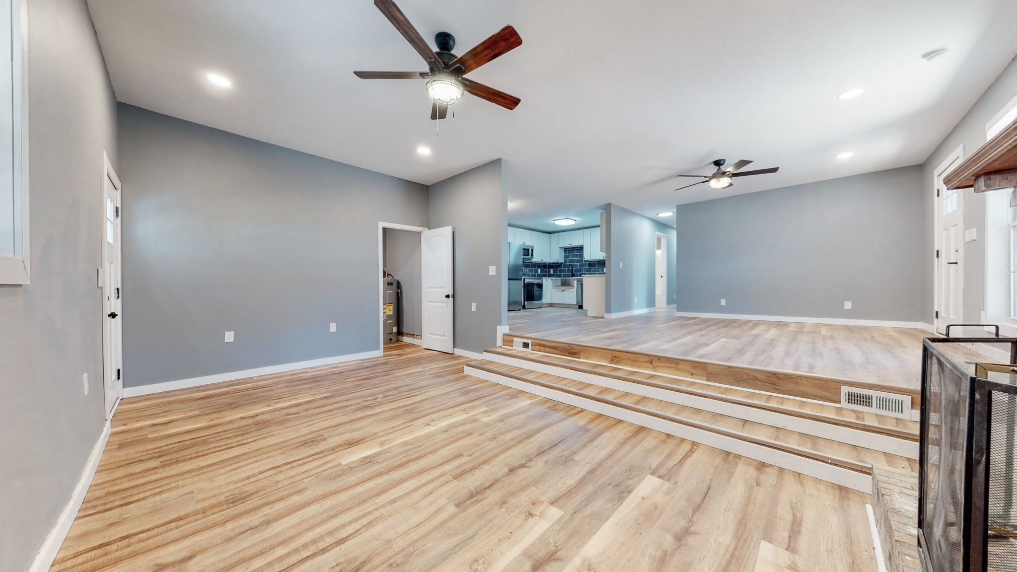 240 Myers Road Winchester, TN 37398 - Photo 11 of 46 an empty room with wooden floor and windows