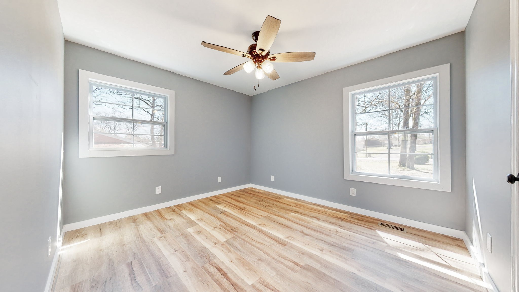 240 Myers Road Winchester, TN 37398 - Photo 20 of 46 a view of an empty room with wooden floor and a window