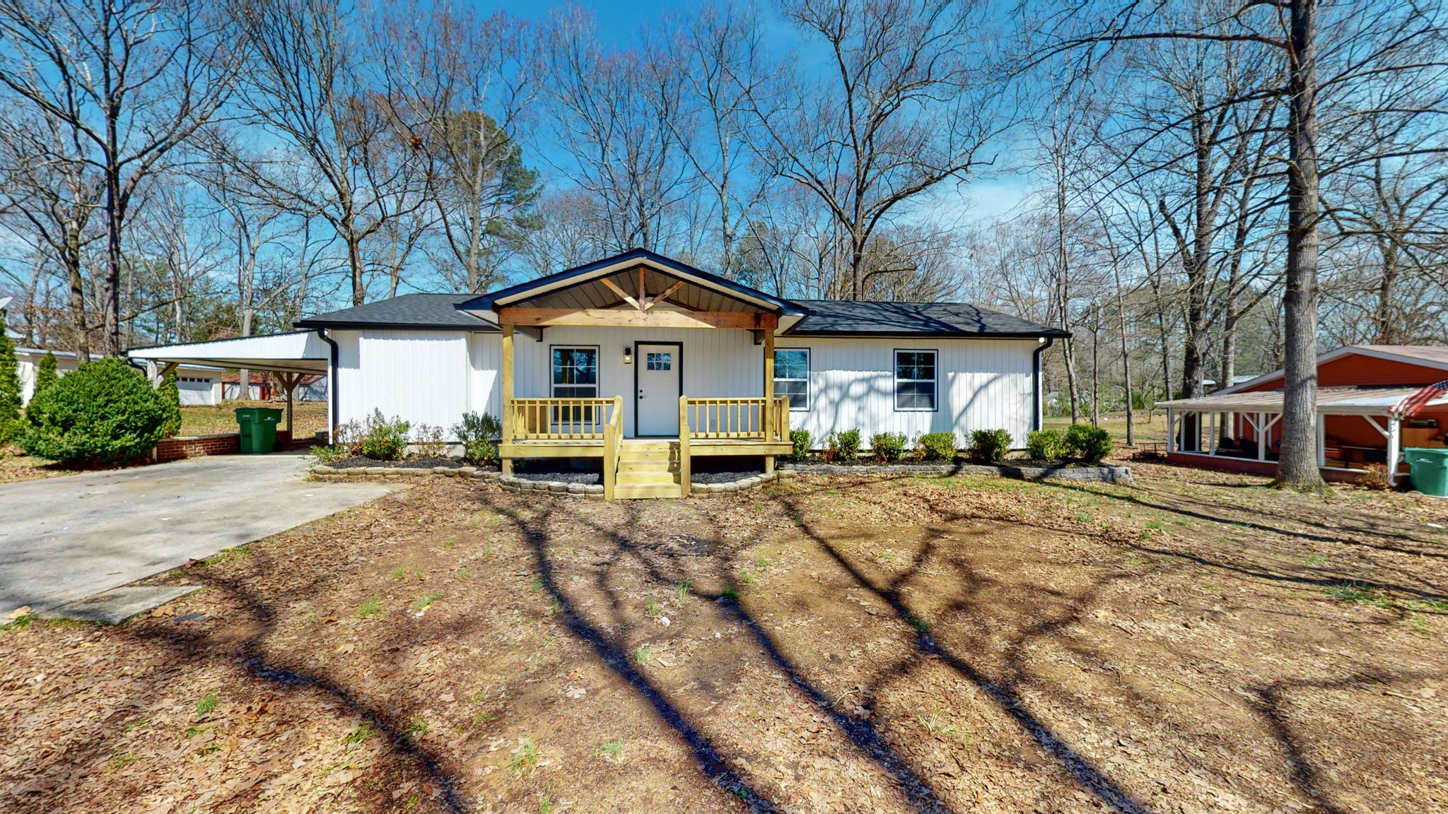 240 Myers Road Winchester, TN 37398 - Photo 2 of 46 a front view of a house with a yard and outdoor seating