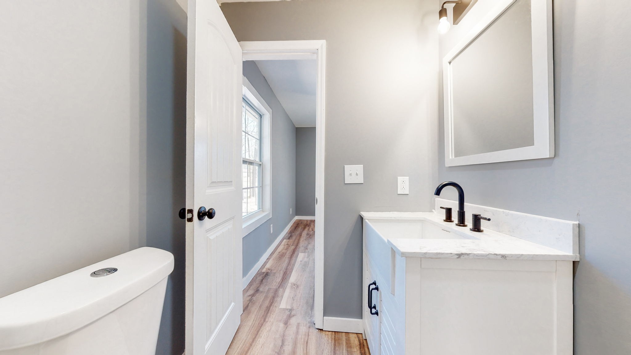 240 Myers Road Winchester, TN 37398 - Photo 24 of 46 a bathroom with a sink a toilet a mirror and shower