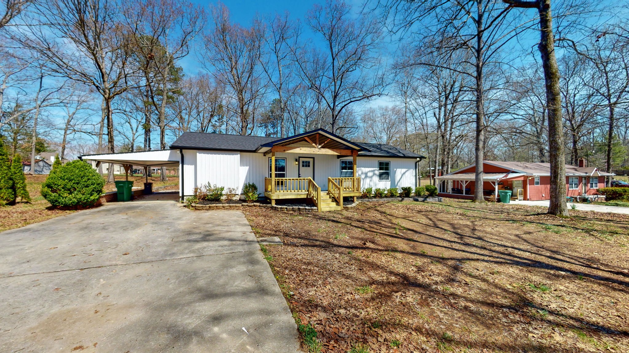 240 Myers Road Winchester, TN 37398 - Photo 3 of 46 a front view of a house with a yard and garage