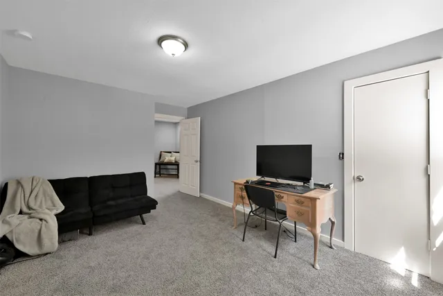 a bathroom with a shower and a toilet