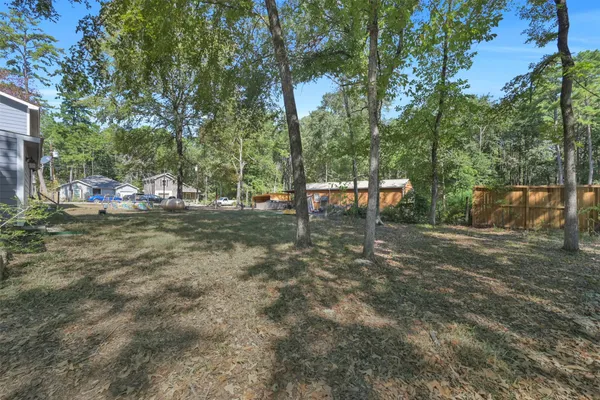 a view of a yard with an outdoor space