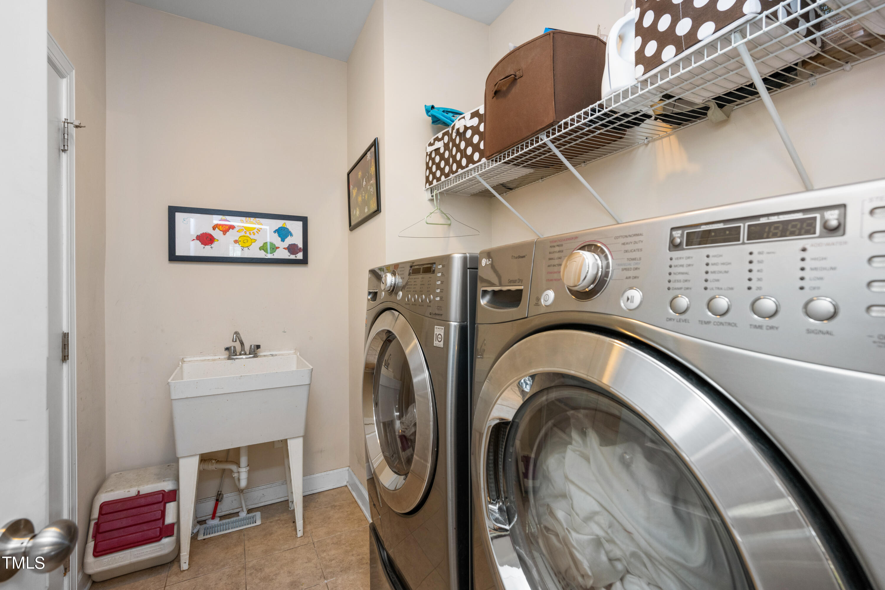 3020 Red Grape Drive Raleigh, NC 27607 - Photo 23 of 37 a utility room with dryer and washer