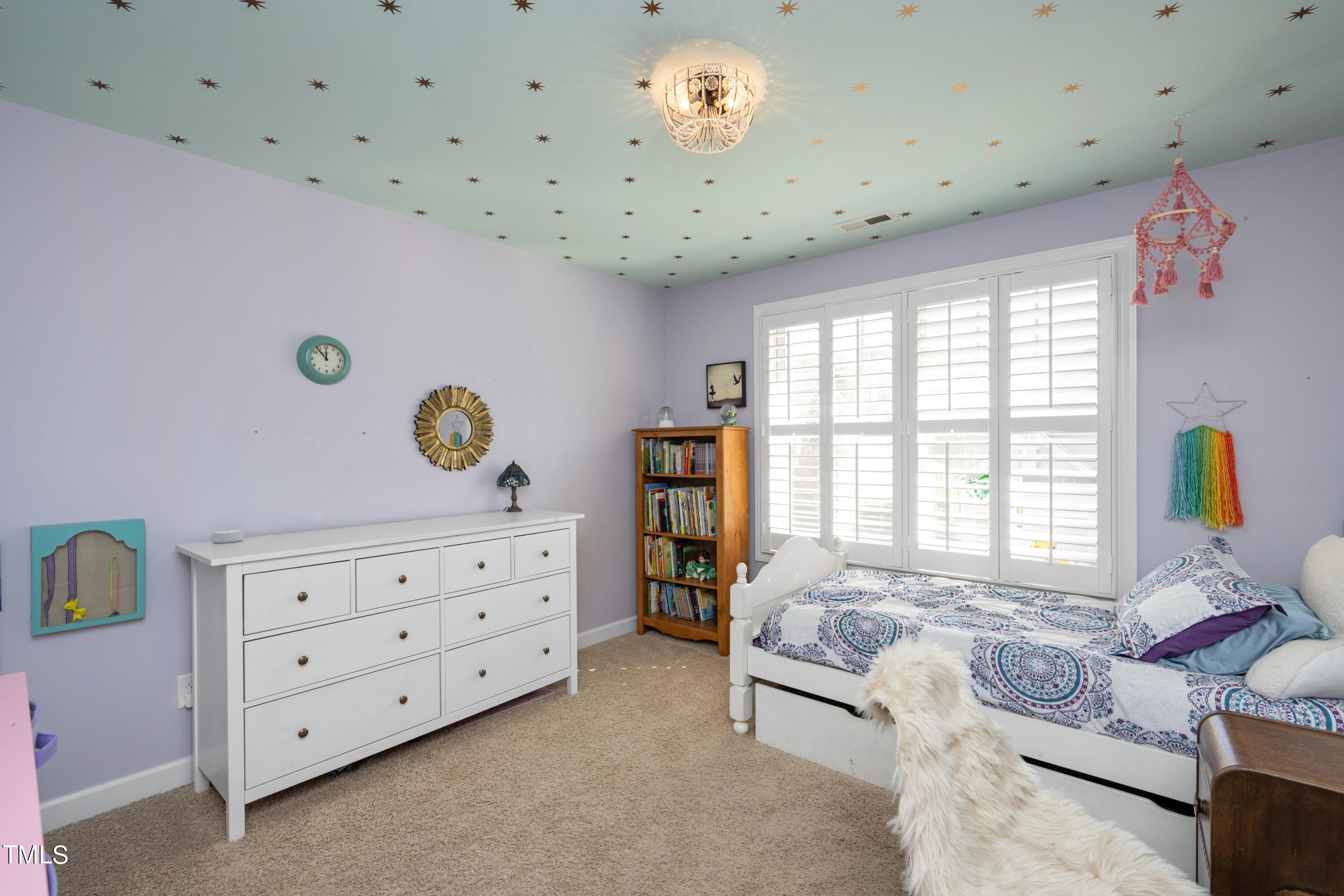 3020 Red Grape Drive Raleigh, NC 27607 - Photo 31 of 37 a spacious bedroom with a bed and with furniture