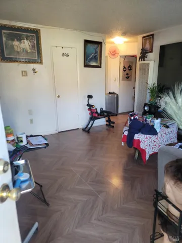 a room with furniture and air hockey table