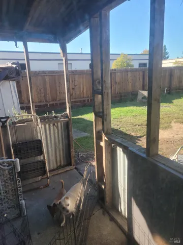 a room with a cabinet and flat screen tv