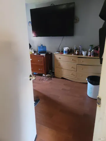 a kitchen with stainless steel appliances a stove a refrigerator and cabinets