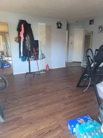 a bedroom with bed and window