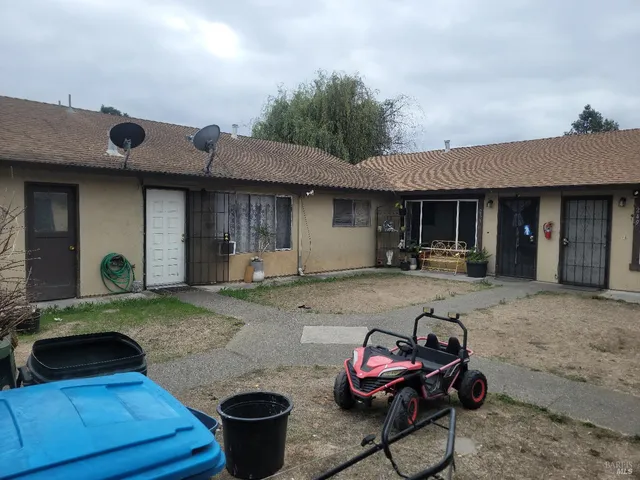 a front view of a house with patio