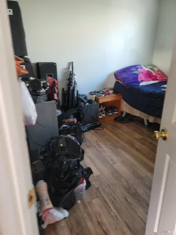 a kitchen with a sink a stove and chairs