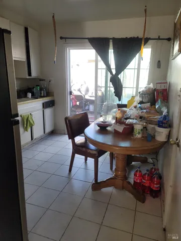 a backyard of a house with seating space