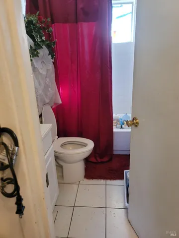 a kitchen with stainless steel appliances a sink stove and cabinets