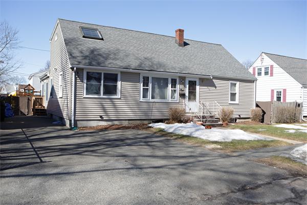1 Arnold Road Peabody, MA 01960 - Photo 1 of 21 a view of a house with snow on the road