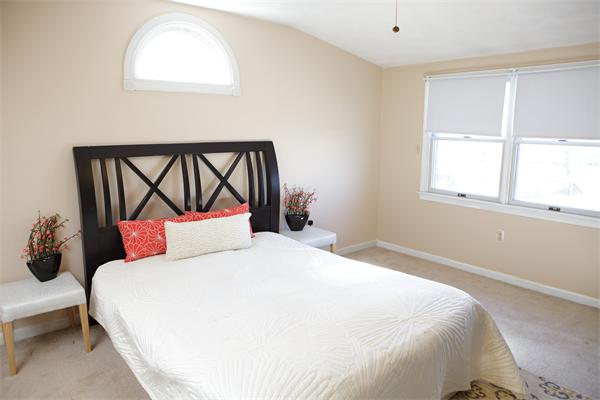 1 Arnold Road Peabody, MA 01960 - Photo 12 of 21 a bedroom with a bed and a window