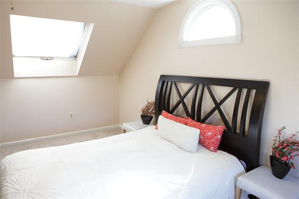 1 Arnold Road Peabody, MA 01960 - Photo 13 of 21 a bedroom with a bed and a window