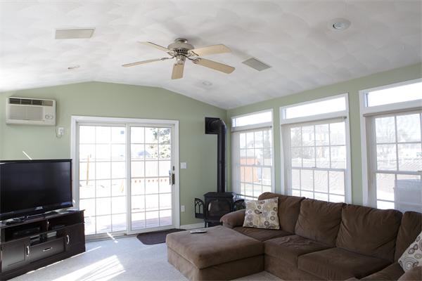 1 Arnold Road Peabody, MA 01960 - Photo 5 of 21 a living room with furniture and a flat screen tv
