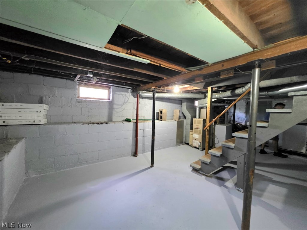 2335 West River Road Newton Falls, OH 44444 - Photo 30 of 36 Spacious basement area featuring painted concrete block walls and a painted concrete floor