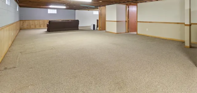 a view of a refrigerator with wooden floor