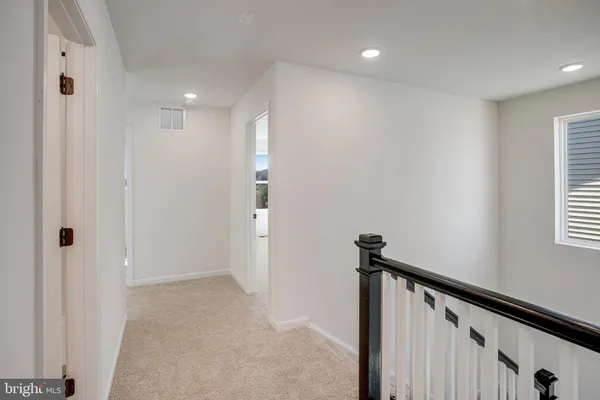 a view of hallway with stairs