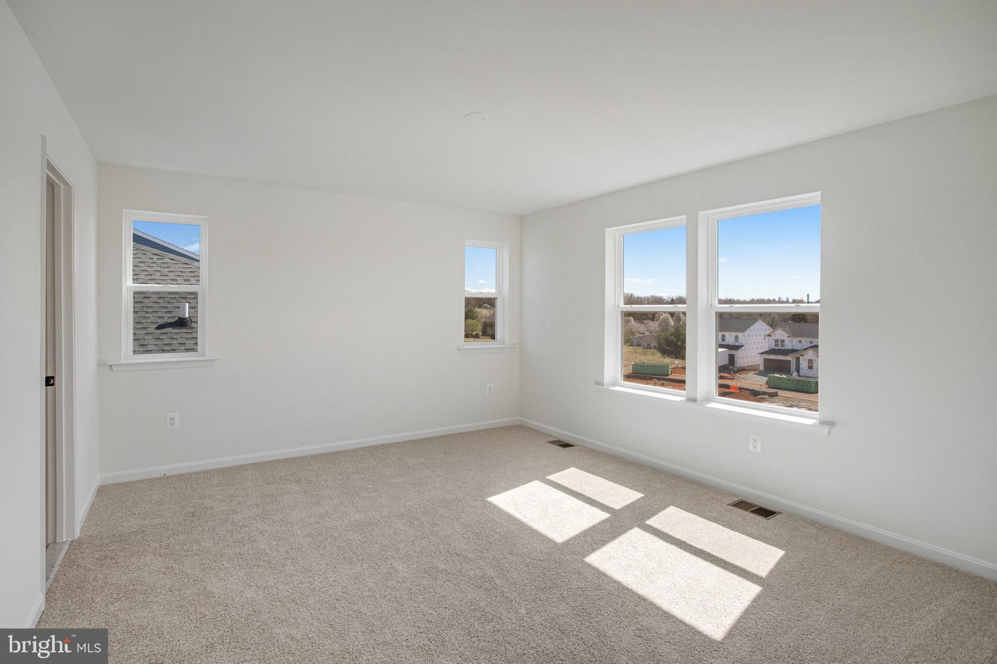 608 Clover Lane Orange, VA 22960 - Photo 17 of 38 an empty room with windows