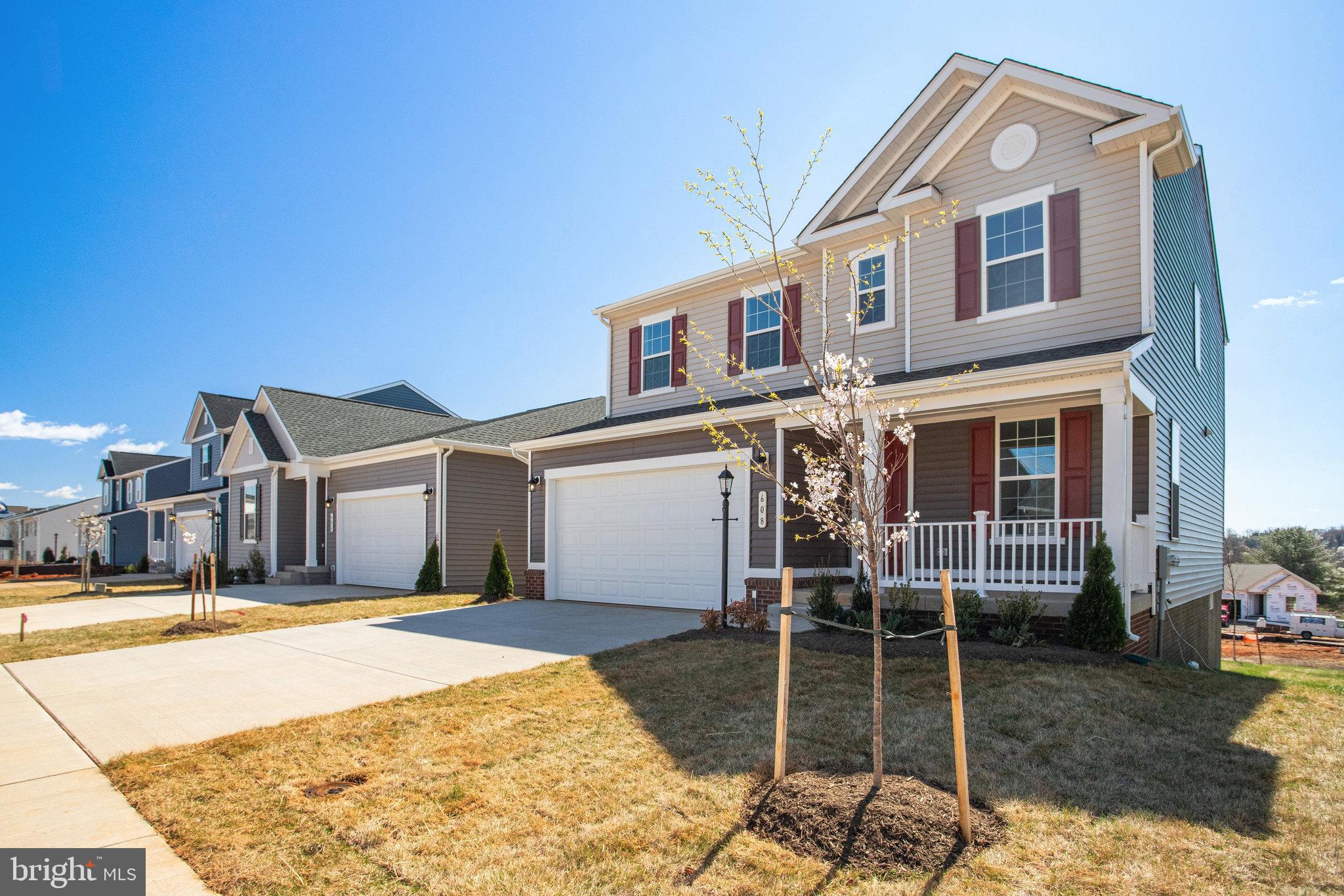 608 Clover Lane Orange, VA 22960 - Photo 2 of 38 a front view of a house with glass windows