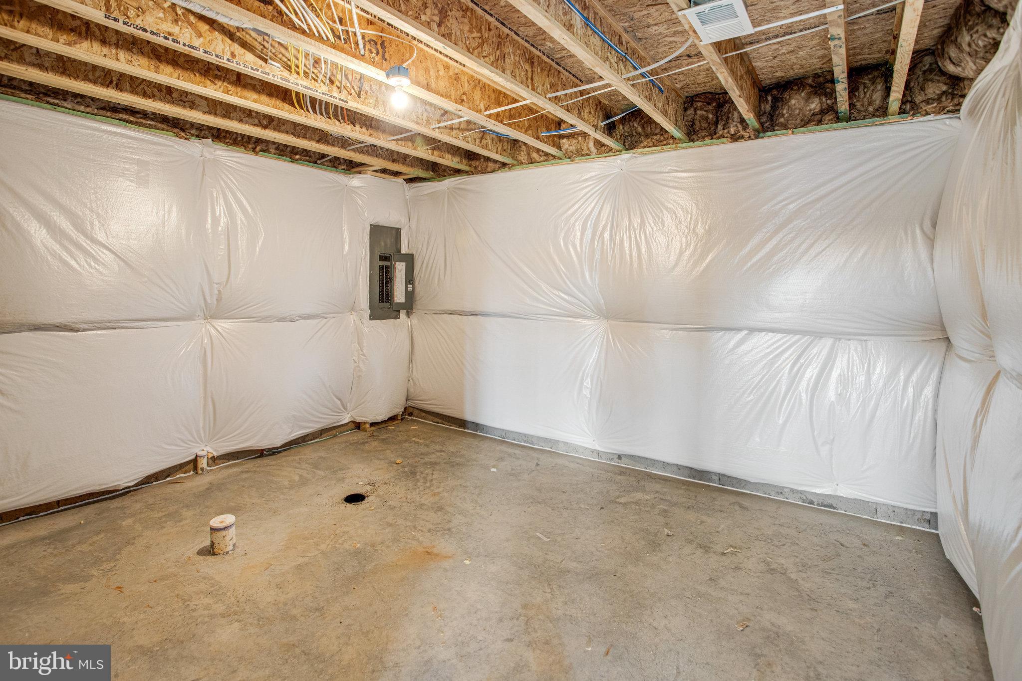 608 Clover Lane Orange, VA 22960 - Photo 22 of 38 a view of a room with racks on the wall