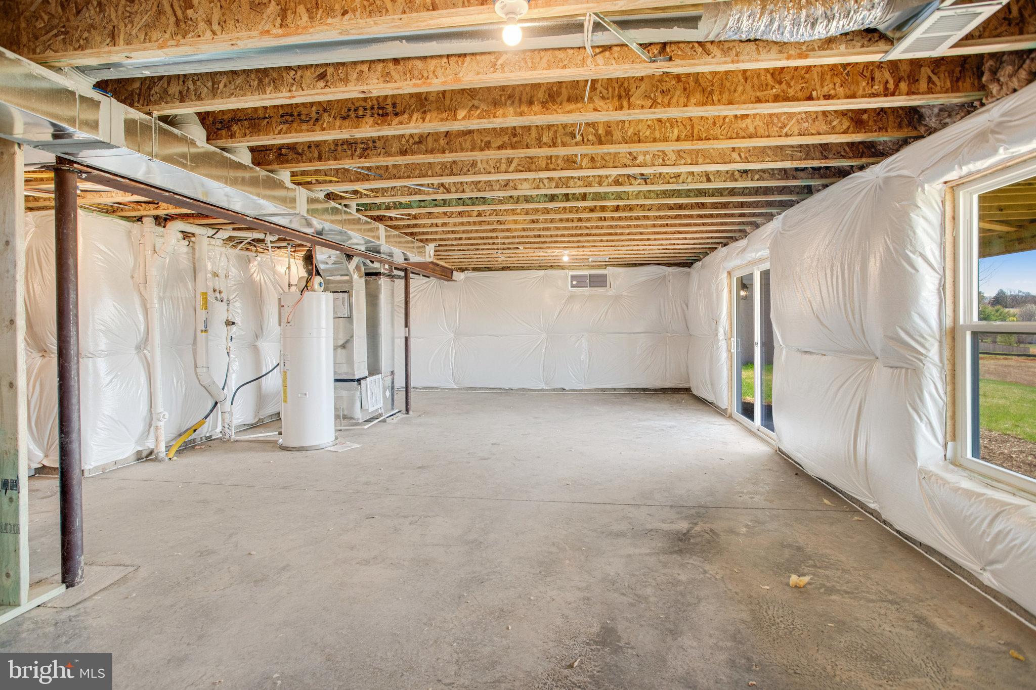 608 Clover Lane Orange, VA 22960 - Photo 23 of 38 a view of an empty room with a window