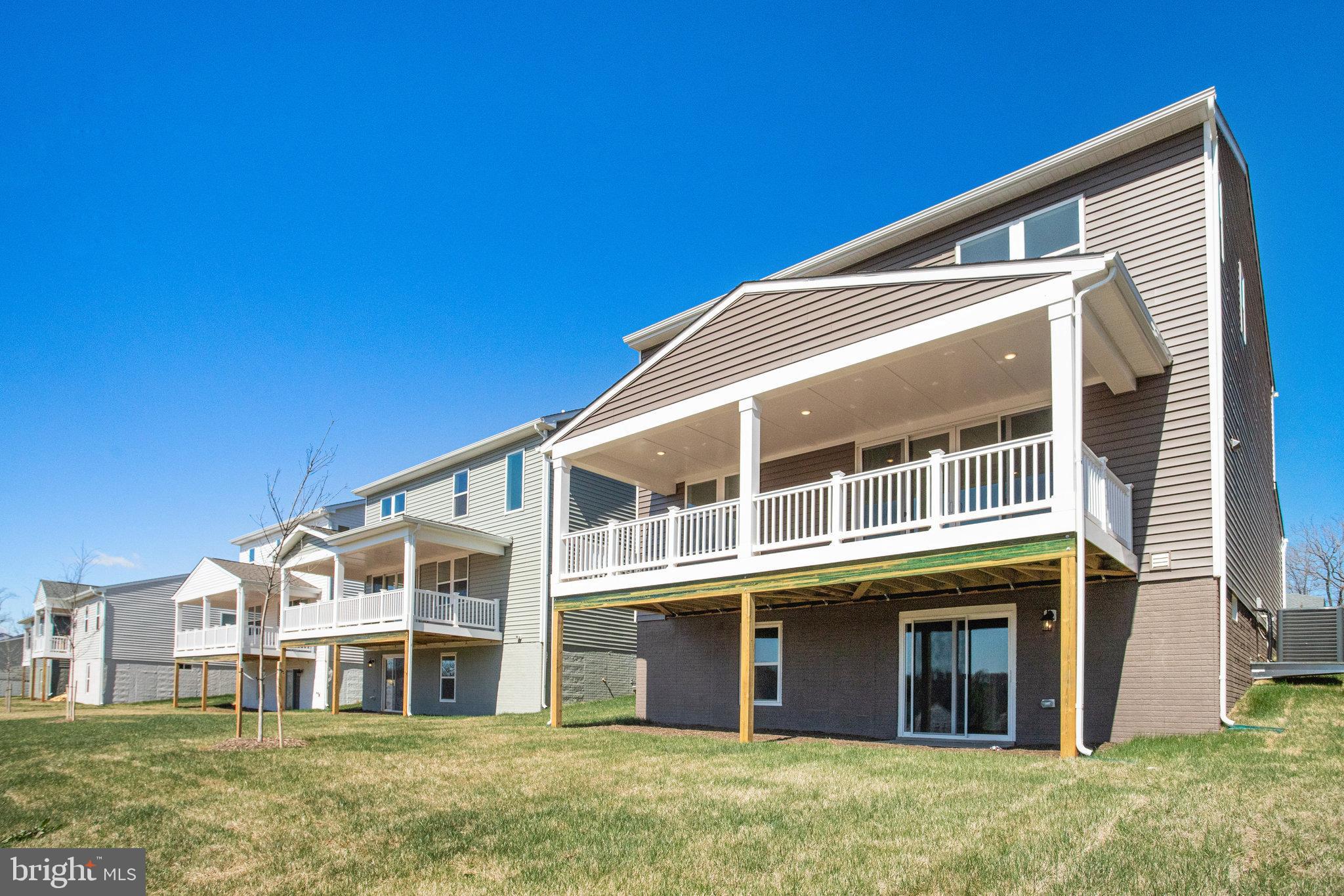 608 Clover Lane Orange, VA 22960 - Photo 38 of 38 a front view of a house with a garden