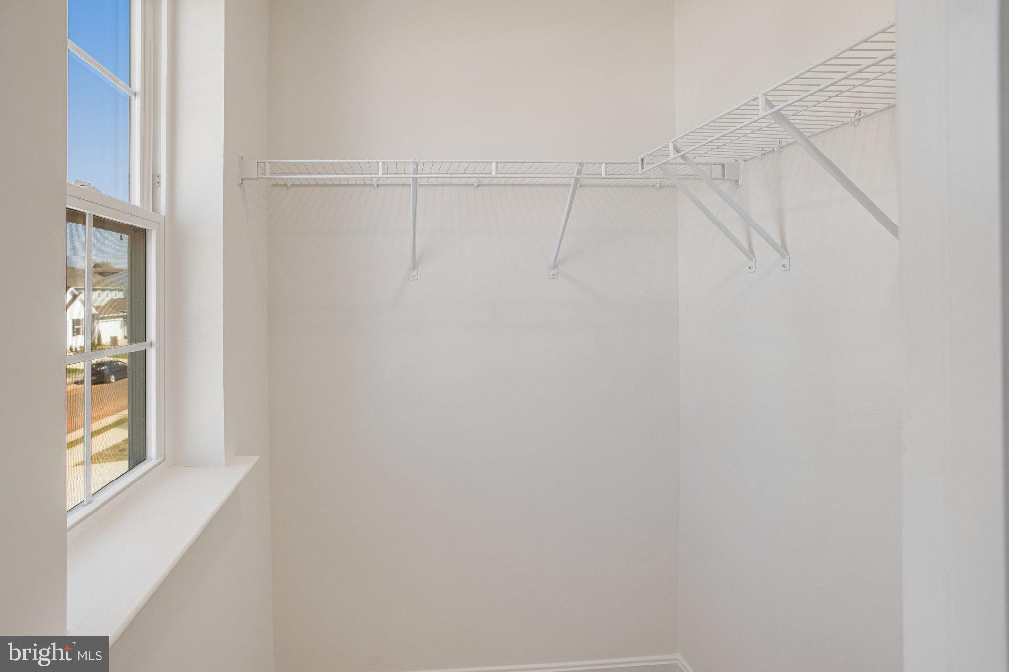 608 Clover Lane Orange, VA 22960 - Photo 8 of 38 a view of a room with racks on the wall