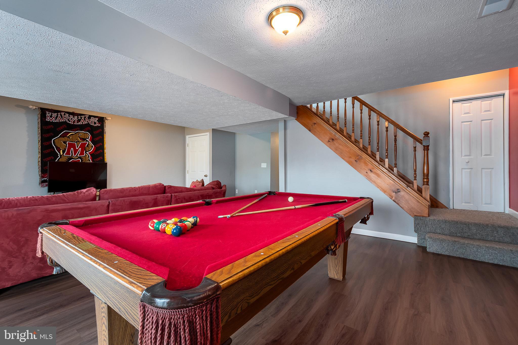 638 Glendale Road Oakland, MD 21550 - Photo 46 of 56 a room with pool table and windows