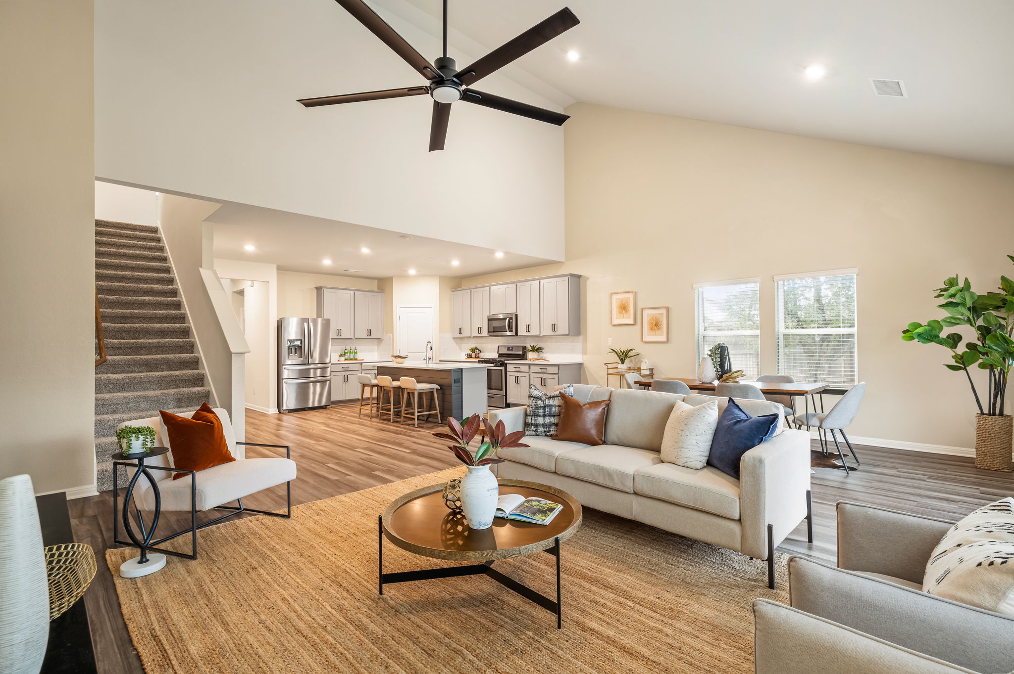 1509 Deering Run Leander, TX 78641 - Photo 12 of 38 Seamless flow between living, dining, and kitchen areas